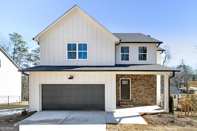 modern farmhouse featuring a garage