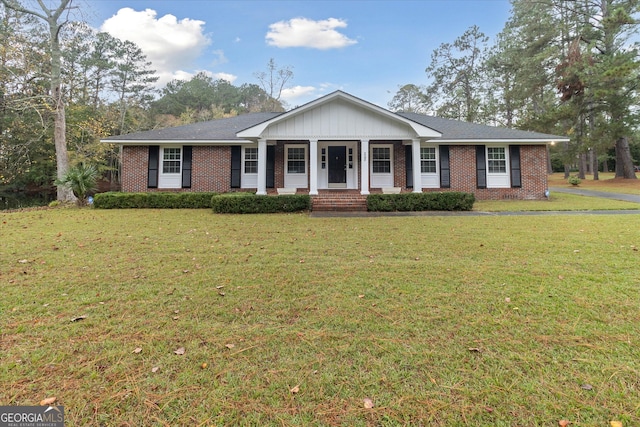 single story home featuring a front yard and a porch