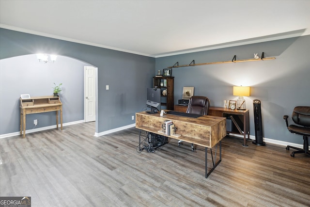 office space featuring hardwood / wood-style floors and crown molding