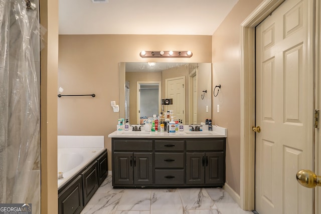 bathroom with vanity and a tub to relax in