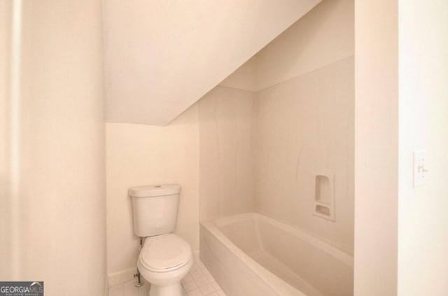 bathroom featuring tile patterned floors and toilet