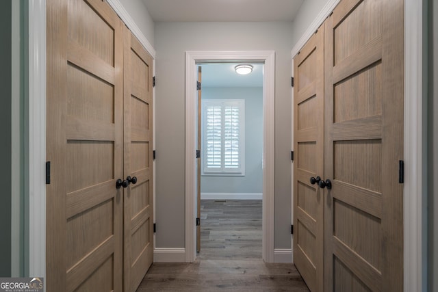 corridor featuring light hardwood / wood-style flooring