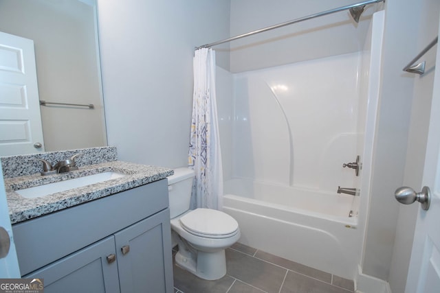 full bathroom with tile patterned floors, shower / bath combination with curtain, toilet, and vanity