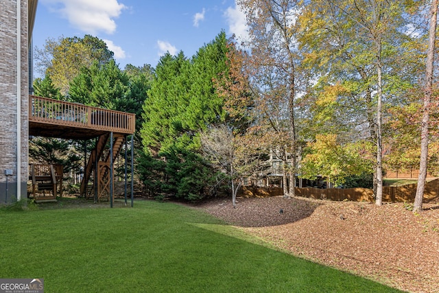 view of yard featuring a deck