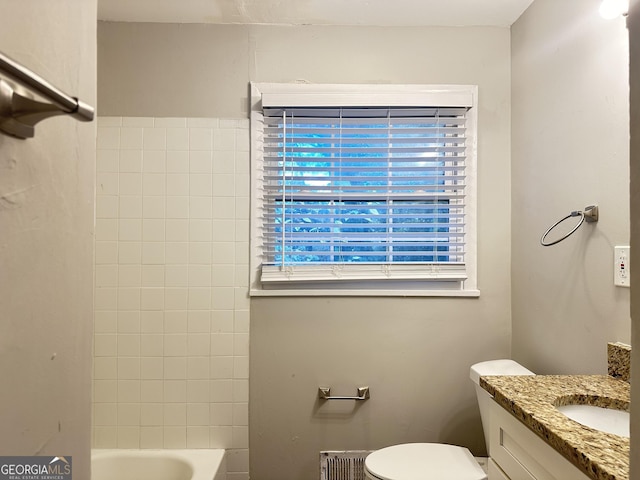 2190 Westover Dr, East Point, GA 30344 - bathroom with radiator heating unit, toilet, vanity, and washtub / shower combination