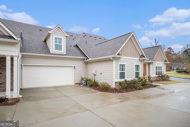 view of side of home with a garage