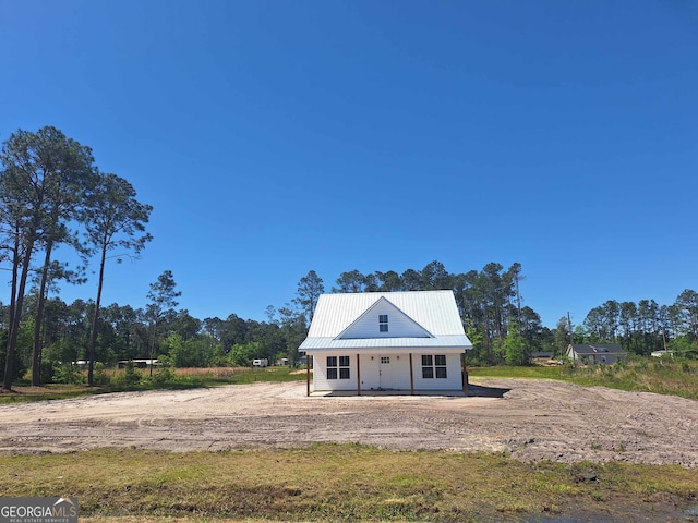 view of front of home featuring metal roof
