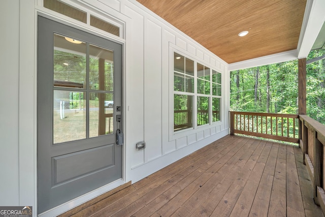 wooden terrace featuring a porch