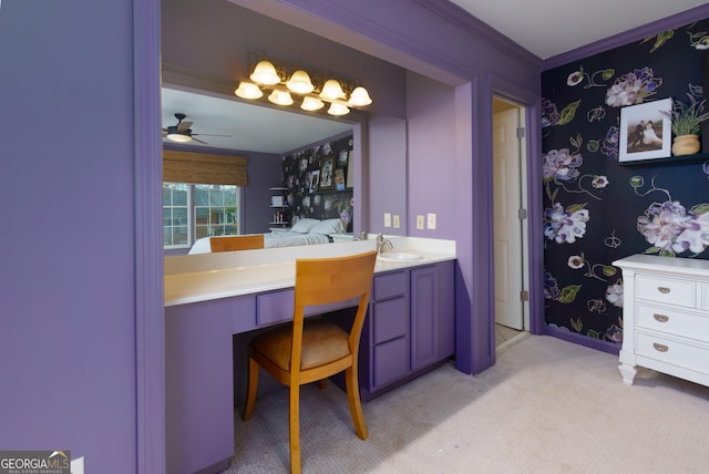 bathroom featuring ceiling fan, vanity, and ornamental molding