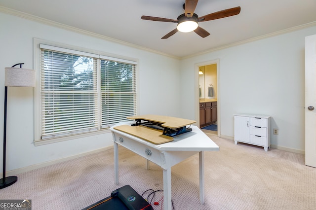 office area featuring light carpet, ceiling fan, and ornamental molding