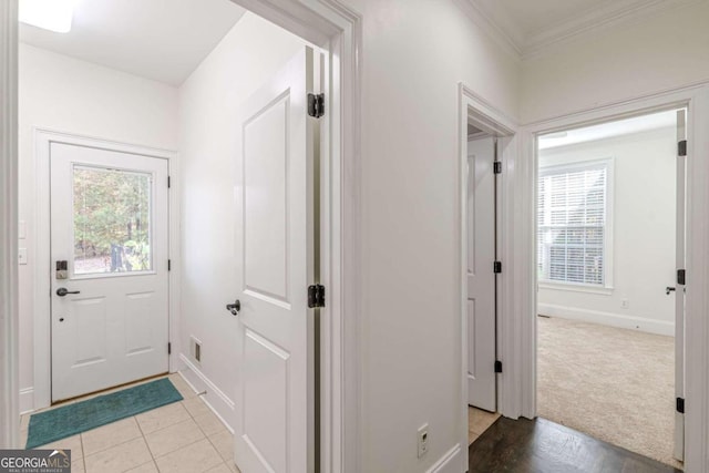 interior space with light carpet and crown molding