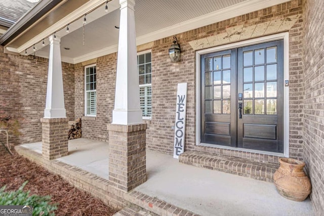 property entrance with french doors and a porch