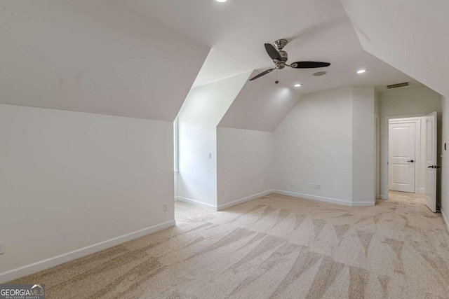 bonus room featuring light carpet, ceiling fan, and lofted ceiling