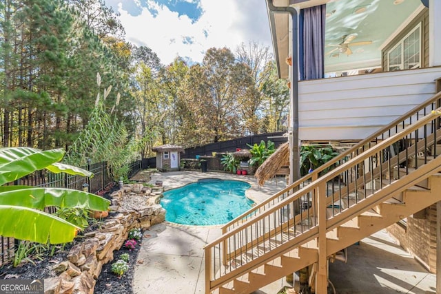 view of swimming pool with a patio area