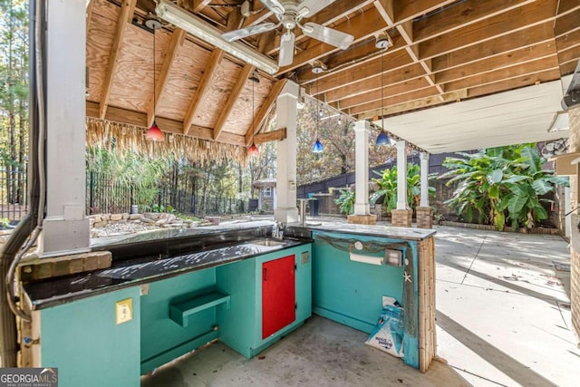 view of patio with ceiling fan