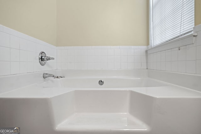 bathroom featuring a bathing tub