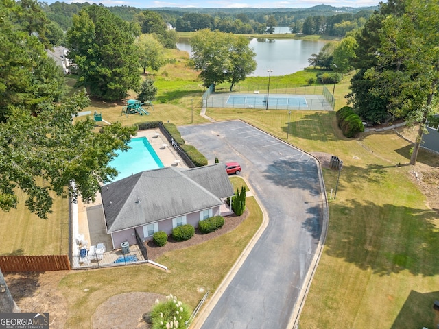 birds eye view of property featuring a water view