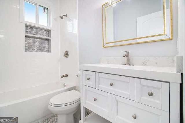 full bathroom with vanity, toilet, and tub / shower combination