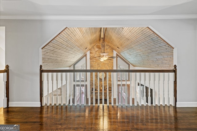 interior space with wood ceiling, a wealth of natural light, and dark wood-type flooring