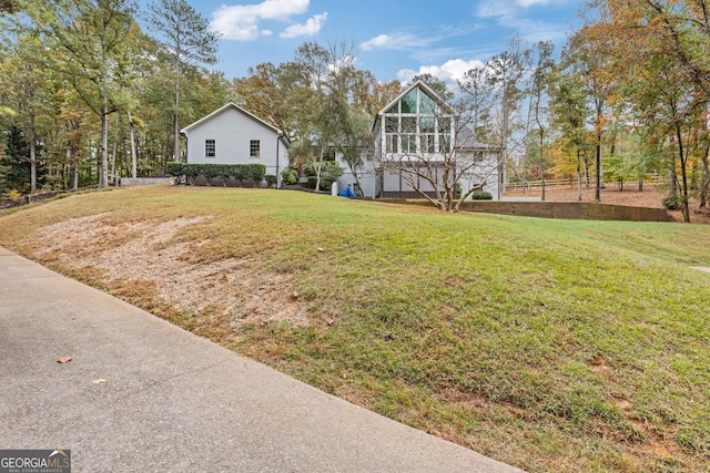 view of yard featuring a sunroom