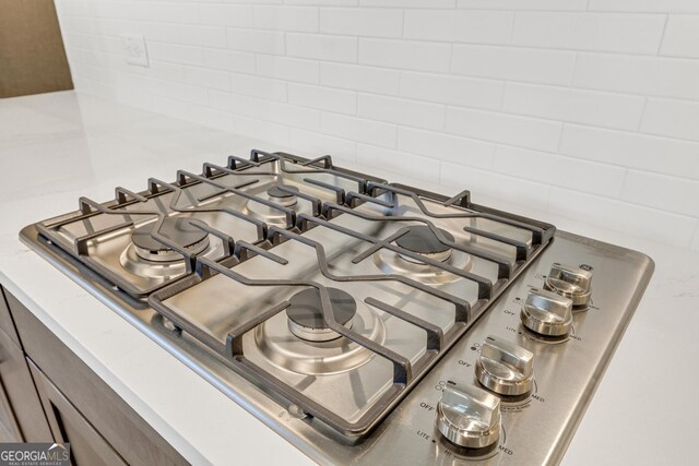 details featuring stainless steel gas cooktop