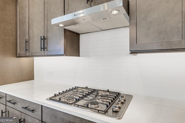 kitchen featuring backsplash and stainless steel gas cooktop