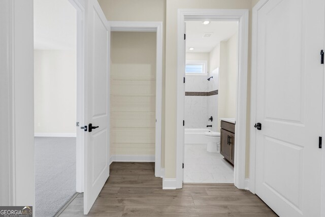 hall featuring light hardwood / wood-style floors