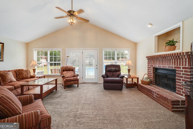 living room featuring carpet flooring, high vaulted ceiling, plenty of natural light, and ceiling fan