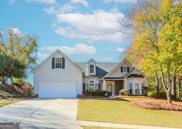 view of front facade with a garage and a front lawn