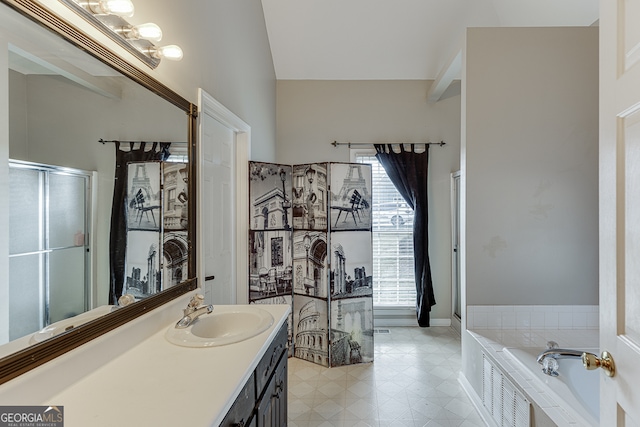 bathroom with a bath and vanity