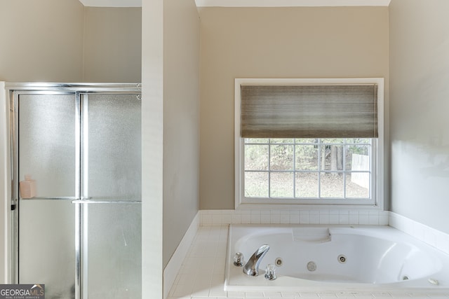 bathroom with tiled bath