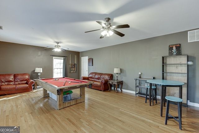 playroom with light hardwood / wood-style floors and billiards