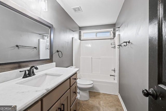 full bathroom featuring toilet, vanity, visible vents, baseboards, and shower / washtub combination