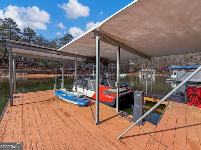 dock area featuring a water view