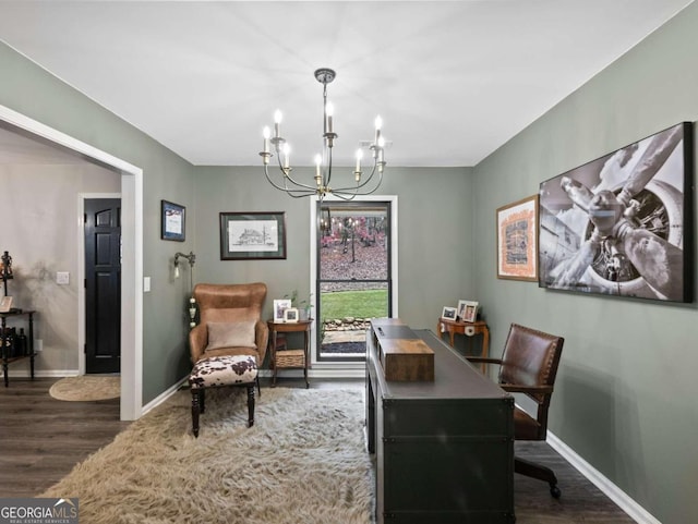 office area featuring dark hardwood / wood-style flooring and a chandelier