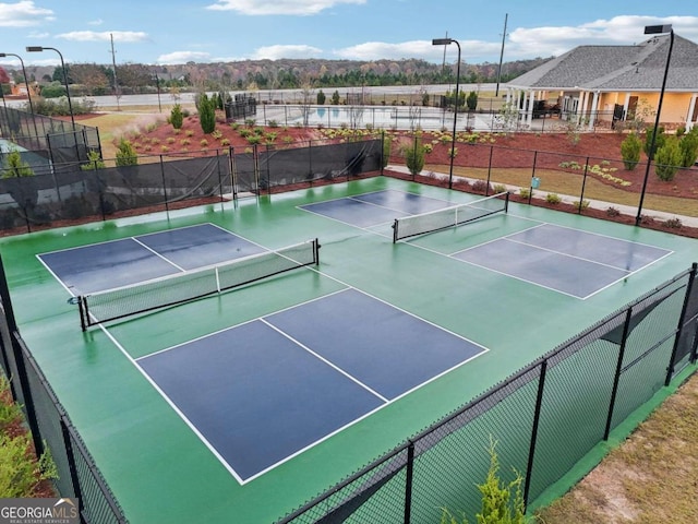 view of sport court featuring basketball court