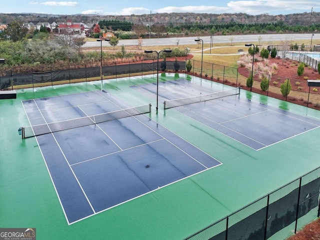 view of tennis court with basketball court