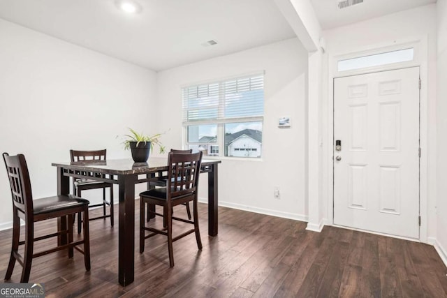 dining room featuring dark hardwood / wood-style floors