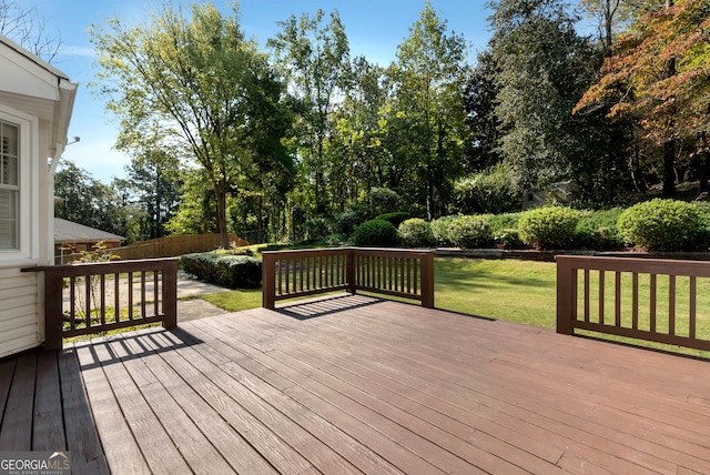 deck featuring a lawn