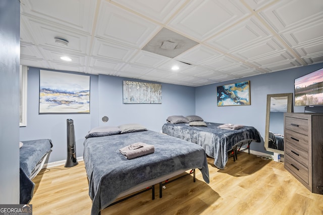 bedroom with light hardwood / wood-style flooring