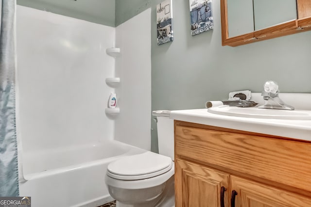 full bathroom with shower / bath combo, vanity, and toilet