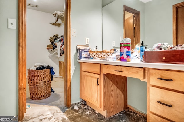 bathroom featuring vanity and concrete floors