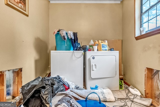 laundry area with washing machine and clothes dryer