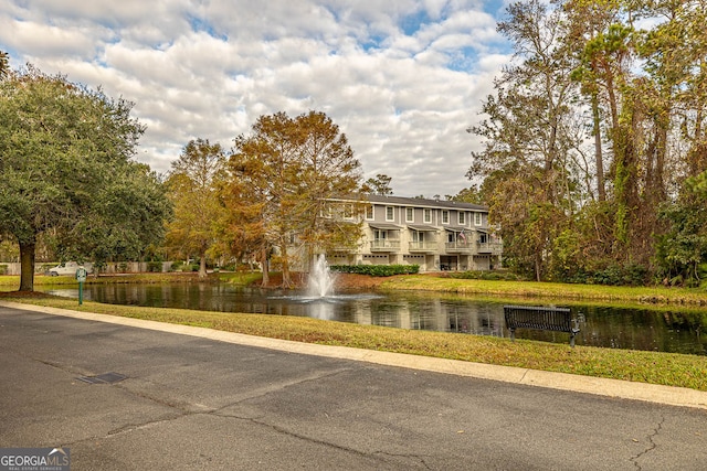 exterior space with a water view