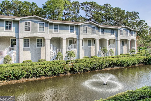 view of front of home featuring a water view