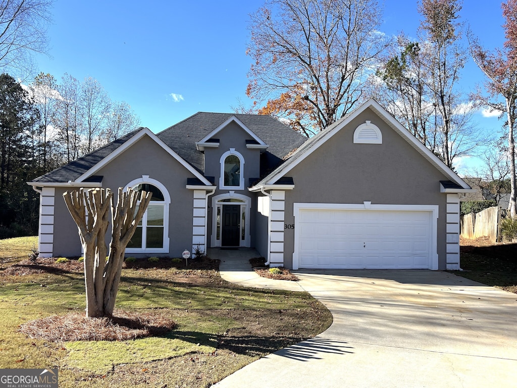 view of front of house with a garage