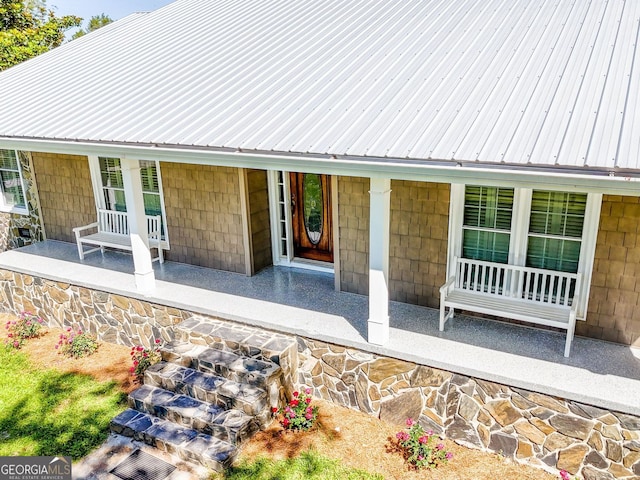 back of house with covered porch