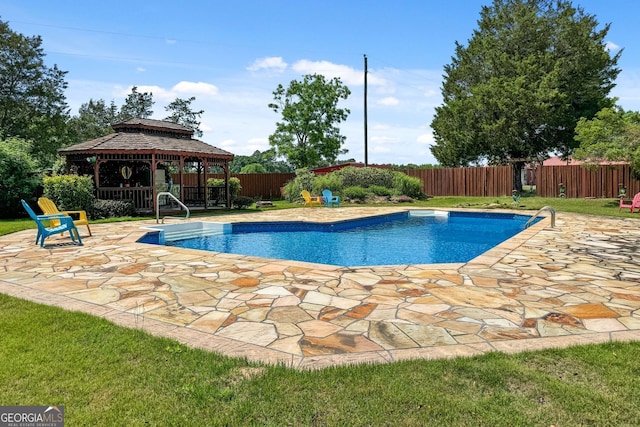 view of swimming pool with a gazebo and a patio area