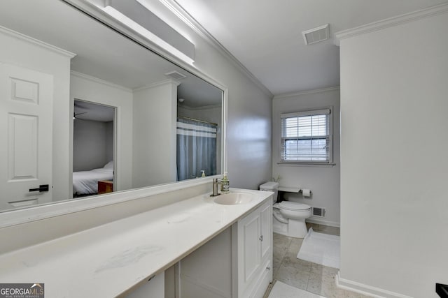 bathroom featuring ceiling fan, tile patterned flooring, toilet, vanity, and ornamental molding