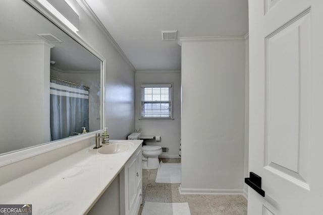 bathroom featuring vanity, toilet, and crown molding